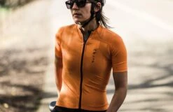 PEdALED Mirai Lightweight Women Jersey - Orange -KOO shop women cycling jersey road orange mirai in action pedaled